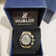 ساعت هابلوت سه موتوره مشکی طلایی صفحه اسکلتون