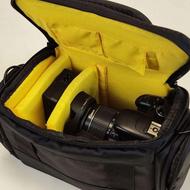 کیف دوربین عکاسی کانن در از بالا بهمراه کاور باران