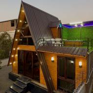 کلبه چوبی واقع شده در دل جنگل در کنار رودخانه با ویو رودخانه