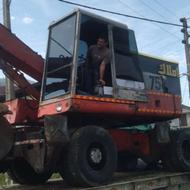 بیل لاستیکی زنجیری پیمانکاری خاکبرداری