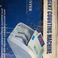 یک عدد دستگاه پول شمار