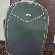 چمدان کوچک طوسی/کار کرده