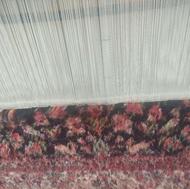 بافنده ی فرش دستبافت