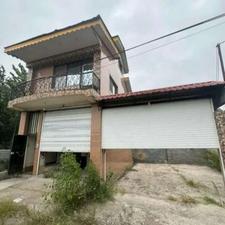 فروش خانه ویلایی به همراه یک مغازه در جاده رودبنه