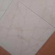 کار کاشی کاری و کارگر ساده