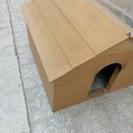 خانه ی سگ چوبی