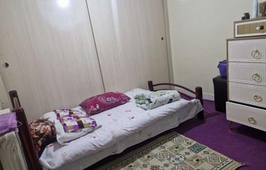 آپارتمان 95 متری و حیاط15 متری