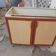 یکعدد کابینت ویک عدد سینک استیل