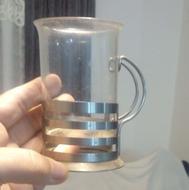 هشت استکان پایه استیل ودوعددقندان ویک عددقوری