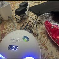 دو دستگاه ناخن کاری و وسایل