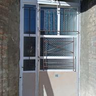 درب آهنی و پنجره المینیوم