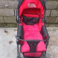 کالسکه کودک به رنگ قرمز