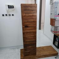 جاکفشی با آینه قدی