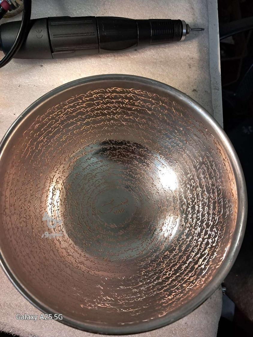 حکاکی روی فلزات و سنگ و.....