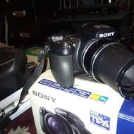 دوربین سونی اچ ایکس 1 و سه پایه