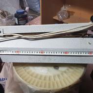 ابزاردستگاه بسته بندی پلاستیک شیرینگ سلفون شیرینی عطاری مشما