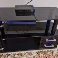 میز تلویزیون شیشه و ام دی اف سه طبقه