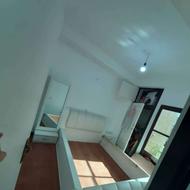 تخت خواب دونفره به همراه میز آرایش و میز بغل تخت