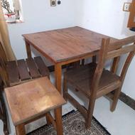 میز به همراه صندلی و چهارپایه