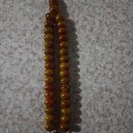 تسبیح کهربا پرچمی