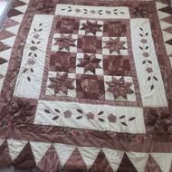 رو تختی دو نفره با دو تا رو بالشتی