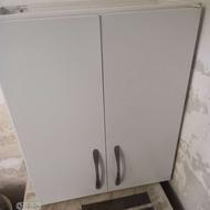 یه عدد کابینت دو در نو می‌باشد