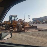 گریدر وغلتک آب‌پاش