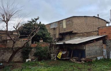 زمین همراه با 3 دهنه مغازه بر اصلی 22 بهمن