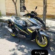 موتور آیروکس مشکی زرد طوسی 11000 تا کار