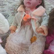 تعدادی اسباب بازی عروسک خارجی وساعت