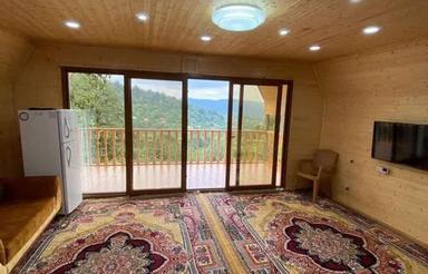 اجاره کلبه چوبی تراسدار همراه به جکوزی در لفور - لودشت