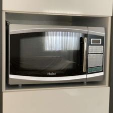 مایکروویو Haier لمسی با گریل داخلی جاداره و‌بزرگ