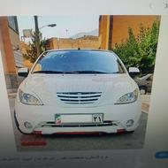 یک عدد جلو پنجره تیبا اسپرت و قاب مانیتور