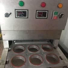 دستگاه بسته بندی زیتون و ترشی جات