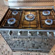 اجاق گاز 5شعله ومیزتلویزیون