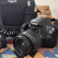 دوربین عکاسی canon1300D و سه پایه دوربین