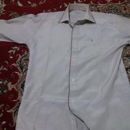 یک. عددشلوارنوبایک عددلباس مردانه دکمه ای