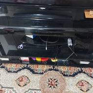 میز تلویزیون شیشه ای