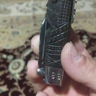 چاقو و تسبیح فروشی