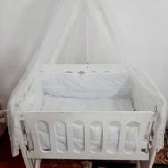 گهواره نوزاد..رنگ سفید...دارای تور بالای گهواره..